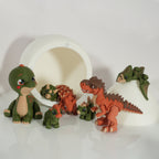 Open dino egg with a collection of articulated dinosaur figures around it