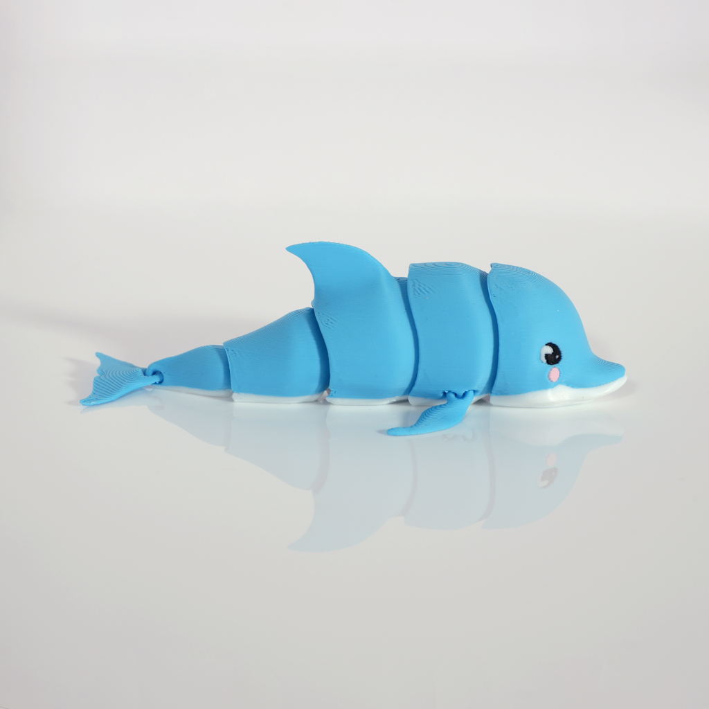 Side view of the blue dolphin showing its articulated body segments