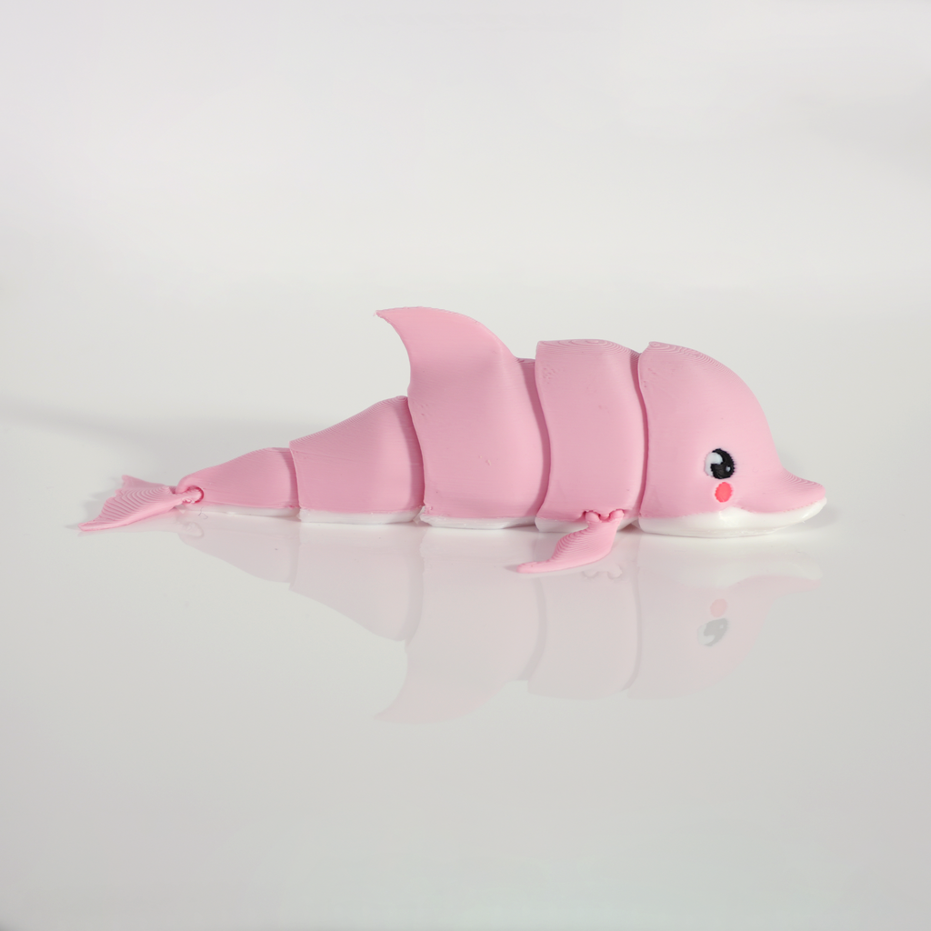 Side view of the pink dolphin showing its articulated body segments