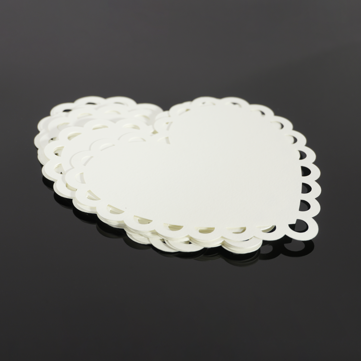 Stack of Lace Heart cut paper pieces