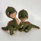 Two articulated Tiny Diny dinosaurs posed together
